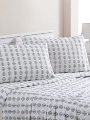 Printed four-piece ultra-soft sheet and pillowcase set, deep pocket design, accommodates mattresses up to 16 inches thick.
